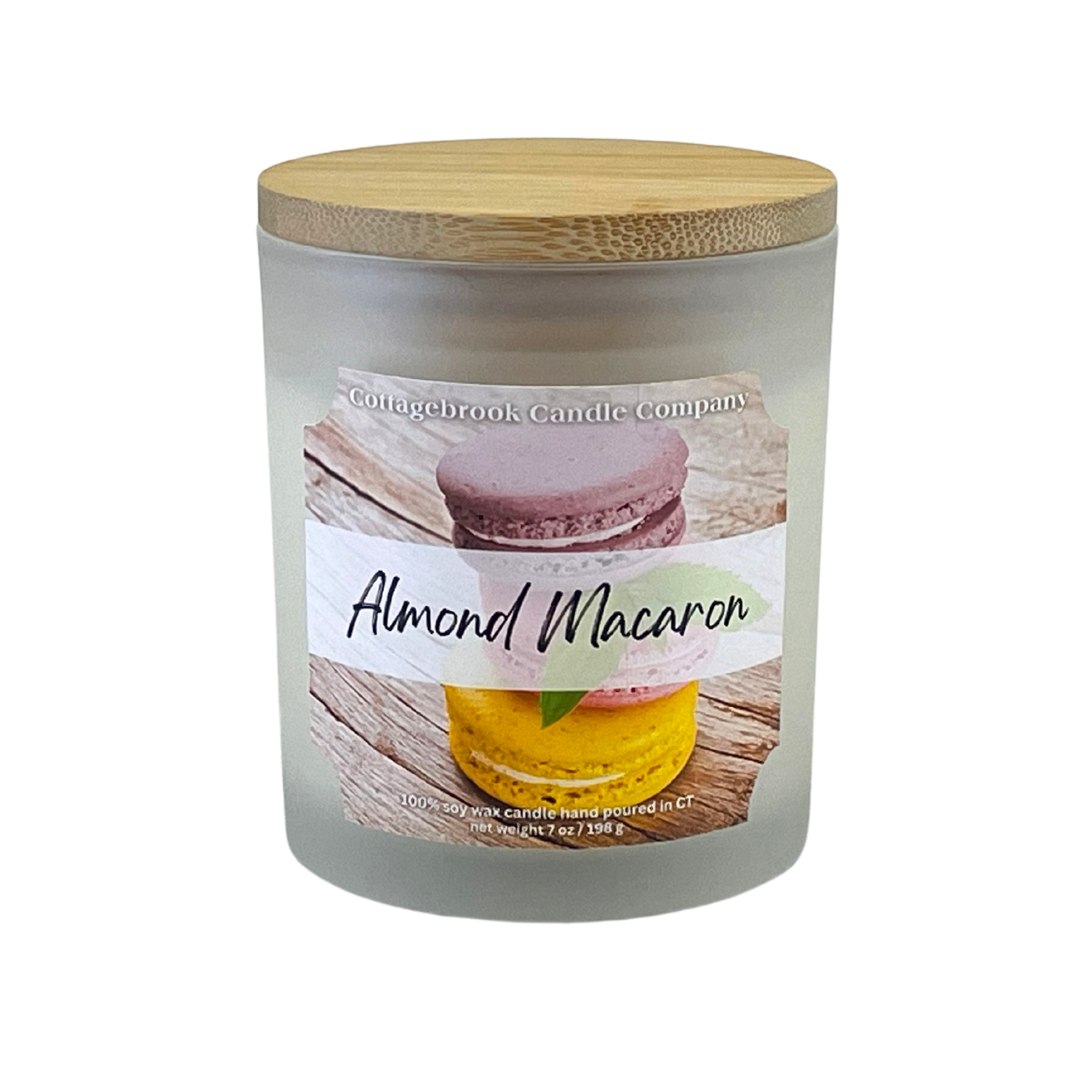 100% Soy Wax Candle with 'Almond Macaron' label on frosted glass container with bamboo lid